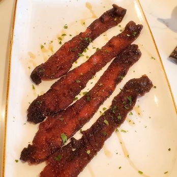 First Watch - Million Dollar Bacon (Four slices of Fist Watch's smoked bacon baked with brown sugar, black pepper, cayenne and a maple syrup drizzle). - Breakfast & Brunch Near Me - Paramus, New Jersey
