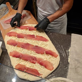 Farini - A delicious pizza in the making! - Italian Near Me - Venezia, VE