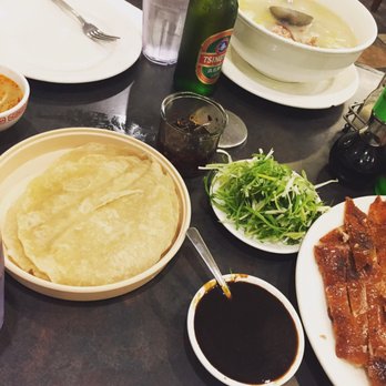Peking Cuisine - Chinese Tortilla, hoisin sauce, and scallions. Duck broth soup in the back - Chinese Near Me - Houston, Texas