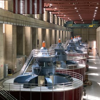 Hoover Dam - Alternators that actually generate the power, these are driven by turbines below this room which are spun by water flowing through the dam. - Landmarks & Historical Buildings Near Me - Boulder City, Nevada