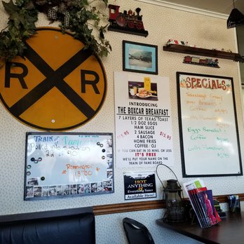 Crossing Diner - a railroad crossing sign on the wall - New American Near Me - Dundee, New York