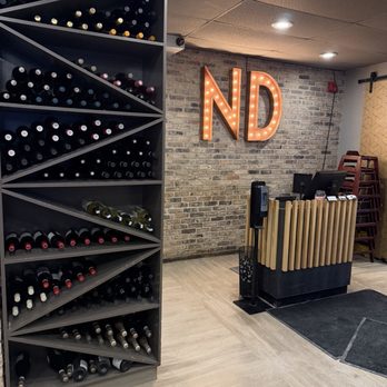 NextDoor Restaurant - Indoor entrance with wine rack - Canadian (New) Near Me - Markham, Ontario