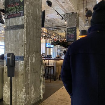 Central Kitchen + Bar - Bar area by entrance - Gastropubs Near Me - Detroit, Michigan Central Kitchen + Bar - Bar area by entrance - Gastropubs Near Me - Detroit, Michigan
