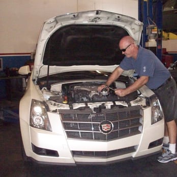 Integrity Automotive - Not just exhaust. Randy installs a waterpump on a Caddy CTS. - Auto Repair Near Me - Orlando, Florida Integrity Automotive - Not just exhaust. Randy installs a waterpump on a Caddy CTS. - Auto Repair Near Me - Orlando, Florida