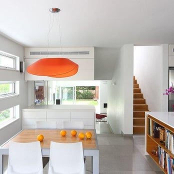 Corniel Construction - a kitchen with a table and chairs - General Contractors Near Me - New York, New York