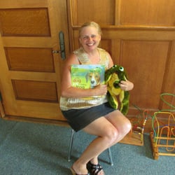 Gilbertville Library Assoc - Scruffy person with scruffy stuff she bought