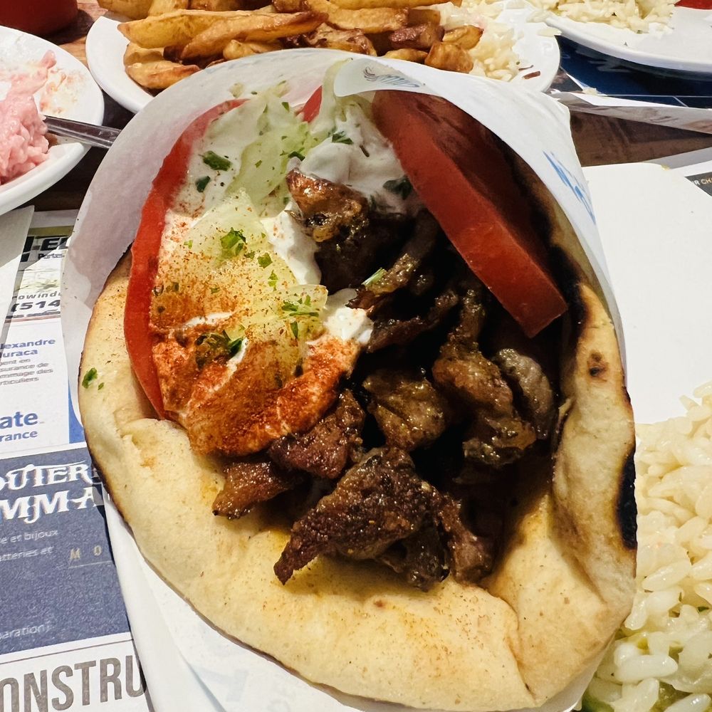 Nostos - Gyro Pita 1-Pork Meat (#14) - Greek Near Me - Montreal, Quebec Nostos - Gyro Pita 1-Pork Meat (#14) - Greek Near Me - Montreal, Quebec
