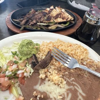 Country Cafe - Fajita Mix. Chicken and Fajita w/ Flour tortillas ,Guacamole, pico, Rice and beans. EVERYTHING SIZZLING STILL!!!! - Mexican Near Me - Grand Prairie, Texas Country Cafe - Fajita Mix. Chicken and Fajita w/ Flour tortillas ,Guacamole, pico, Rice and beans. EVERYTHING SIZZLING STILL!!!! - Mexican Near Me - Grand Prairie, Texas