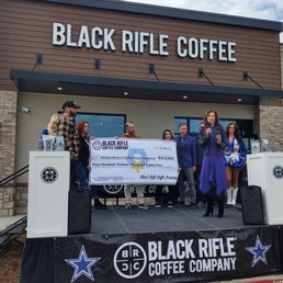 Exterior outside entrance of Black Rifle Coffee - Grand opening event - Frisco, Texas Exterior outside entrance of Black Rifle Coffee - Grand opening event - Frisco, Texas