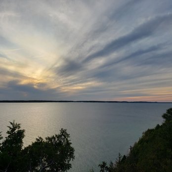The Inn At Stonecliffe - Sunset from Sunset Rock near Stonecliffe. - Venues & Event Spaces Near Me - Mackinac Island, Michigan The Inn At Stonecliffe - Sunset from Sunset Rock near Stonecliffe. - Venues & Event Spaces Near Me - Mackinac Island, Michigan