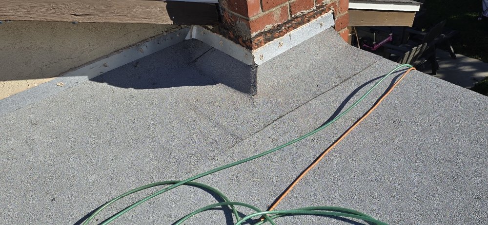 Slide of Kalli Roofing