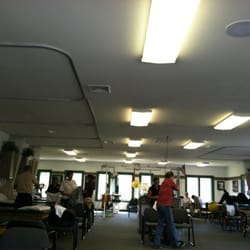 Drayer Physical Therapy Institute - Large room with many tables, therapists and equipment