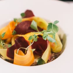 Best starter I've ever had! Pickled veggies on top of slow cooked beef with wasabi cream