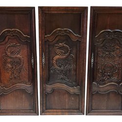 India Street Antiques - Three Late-19th Century French Oak Armoire Doors With Carved Dragons and Foliated Scrolls