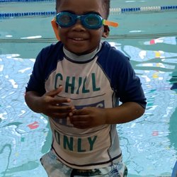 Albany YMCA - Tyson loving swim lessons