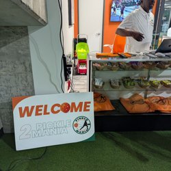Pickle Mania - Welcome desk, check in here