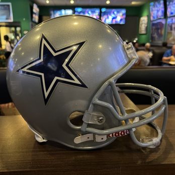 Duffy's Sports Grill - a football helmet on a table - Burgers Near Me - Boynton Beach, Florida Duffy's Sports Grill - a football helmet on a table - Burgers Near Me - Boynton Beach, Florida