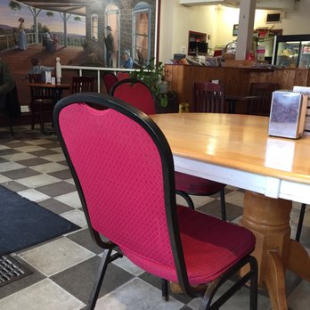 Main Street Pizza - a table and chairs - Pizza Near Me - Athens, Ontario Main Street Pizza - a table and chairs - Pizza Near Me - Athens, Ontario