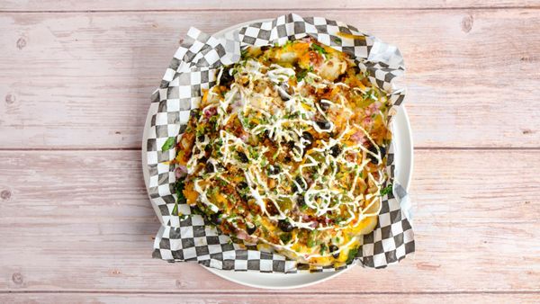 Spuds Loaded Baked Potatoes by null
