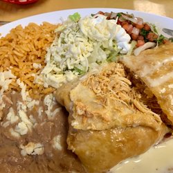 Juanito's Street Tacos - Chicken chimichanga, beans, & rice with pico de galo, lettuce, & sour cream
