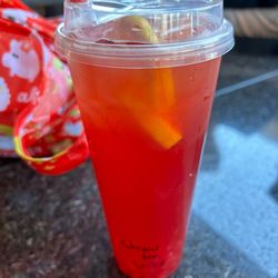 Frodo Joe's Coffee & Tea - Strawberry Tea w/ strawberry bursting boba.