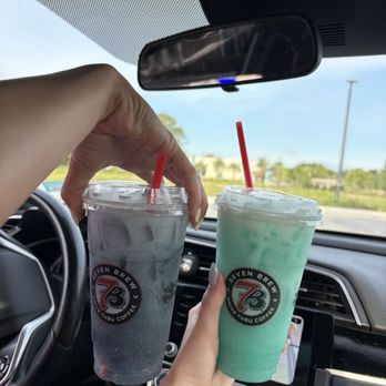 7 Brew Coffee - Left: black mamba with cream, right: blue typhoon with cream - Coffee & Tea Near Me - Lake Worth, Florida