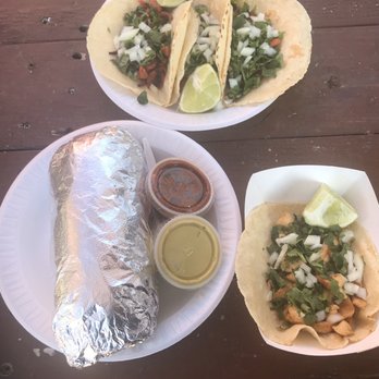 Pollos Asados El norteño #2 - Top is the al pastor tacos, bottom right is a pollo taco, and of course, the pollo burrito large enough to be the size of a small baby - Food Trucks Near Me - Austin, Texas