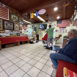9th Ave Barber Shop - American Nostalgia reigns supreme with a well decorated shop. Complete with two Video Poker Machines.