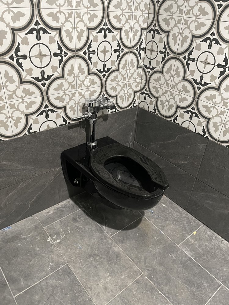 Slide of Pro Plumbers