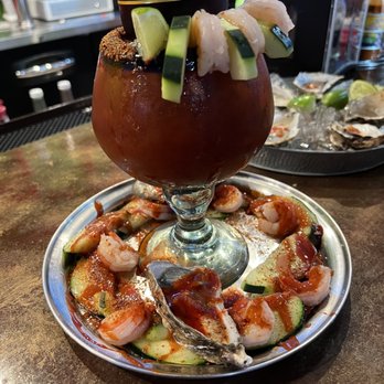 Mi Lindo Nayarit Mariscos - Michelada Mi lindo Nayarit. Spicy beer and tomato juice cocktail with oysters, shrimp and cucumbers! - Mexican Near Me - McMinnville, Oregon Mi Lindo Nayarit Mariscos - Michelada Mi lindo Nayarit. Spicy beer and tomato juice cocktail with oysters, shrimp and cucumbers! - Mexican Near Me - McMinnville, Oregon