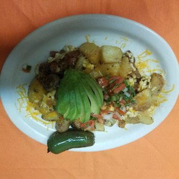 PONCE Restaurant - a plate of food on an orange tablecloth - Latin American Near Me - Bradenton, Florida