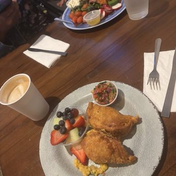 The Collective Cafe - Veggie breakfast empanadas with a side of fruit - Cafes Near Me - Matthews, North Carolina