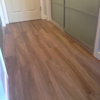 Patkowski Construction - Porcelain wood tile in hallway - Flooring Near Me Patkowski Construction - Porcelain wood tile in hallway - Flooring Near Me