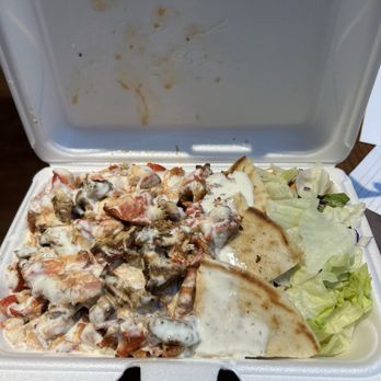 Mustafa's Halal Gyro - Rice platter with extra sauce. - Food Trucks Near Me - Columbus, Ohio Mustafa's Halal Gyro - Rice platter with extra sauce. - Food Trucks Near Me - Columbus, Ohio
