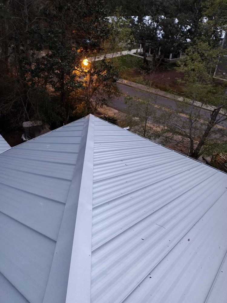 Slide of T-Roys Relief Roofing