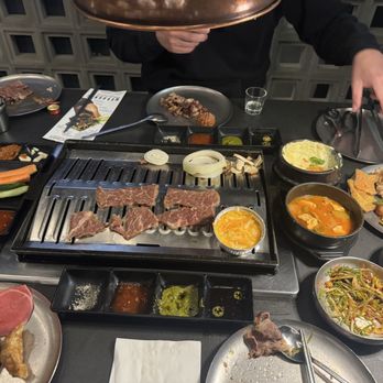 Moohan Korean BBQ - Marinated beef galbi and banchan (sides) - Korean Near Me - Los Angeles, California Moohan Korean BBQ - Marinated beef galbi and banchan (sides) - Korean Near Me - Los Angeles, California