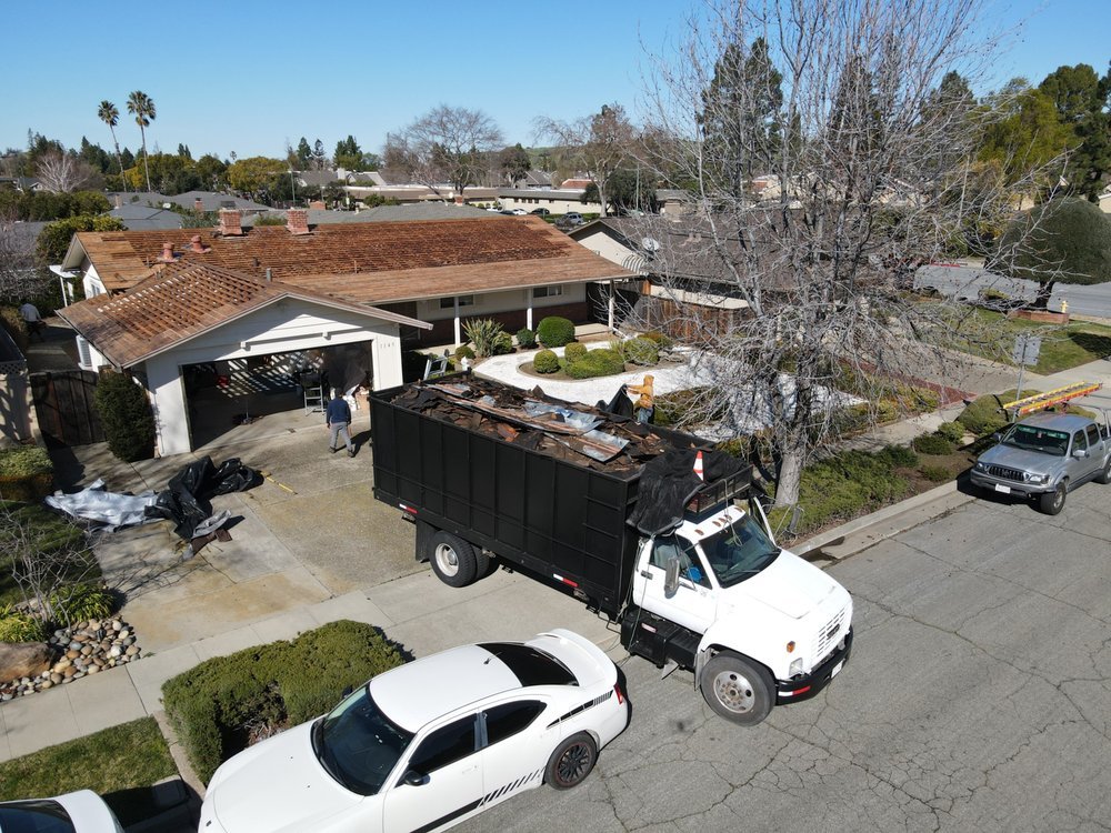 Slide of ELM Roofing Contractors