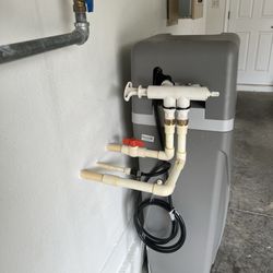 H.I.P Home Service & Drain - The pipes dropping vertically out of the water softener were perfectly straight and level which kept the seals from breaking.