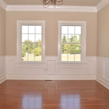 Highland Homes - empty living room with wood floors - General Contractors Near Me - Hagerstown, Maryland Highland Homes - empty living room with wood floors - General Contractors Near Me - Hagerstown, Maryland