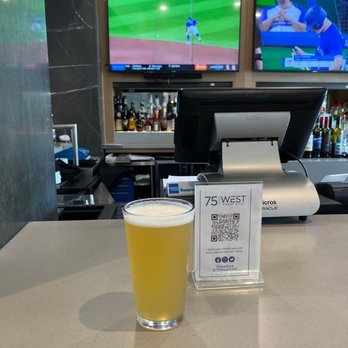 75 West Coast Grill - a pint of beer on the bar - Lounges Near Me - Richmond, British Columbia 75 West Coast Grill - a pint of beer on the bar - Lounges Near Me - Richmond, British Columbia