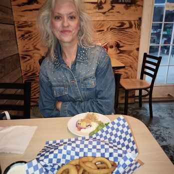 Shelley's - Michelle with onion rings - Seafood Near Me - Rockport, Texas Shelley's - Michelle with onion rings - Seafood Near Me - Rockport, Texas