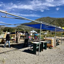 In the process of setting up shade cover for the shooting area.
