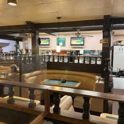 Nico's Family Restaurant - Comfortable seating with TVs