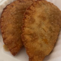 Beef and potato empanada. Came w 2 dif sauces both good I prefer the red/pink one. Beef and potato empanada. Came w 2 dif sauces both good I prefer the red/pink one.