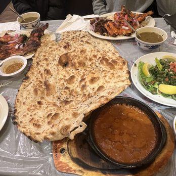 Yemen Cafe & Restaurant - 18. Tabbouli Salad 4. Mashed Fava Beans Foul 19. Lamb Soup 22. Half Chicken Mandi with Rice 69. Rashoosh Bread - Coffee & Tea Near Me - Richmond, California Yemen Cafe & Restaurant - 18. Tabbouli Salad 4. Mashed Fava Beans Foul 19. Lamb Soup 22. Half Chicken Mandi with Rice 69. Rashoosh Bread - Coffee & Tea Near Me - Richmond, California