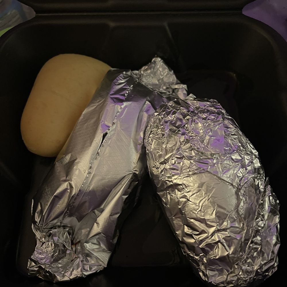 Steak-Out - two potatoes wrapped in aluminum foil - American Near Me - Madison, Alabama