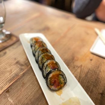 KAI ZAN - a plate of sushi on a wooden table - Asian Fusion Near Me - Chicago, Illinois