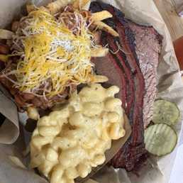 Brisket with chili cheese fries and Mac and cheese Brisket with chili cheese fries and Mac and cheese