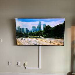 65 inch tv mounted with strip Premwire, Charlotte, NC.