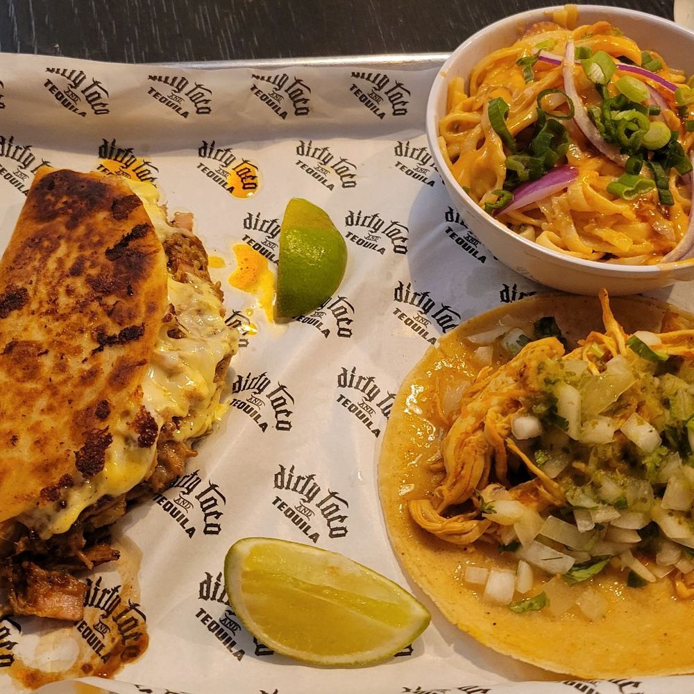 The Cuban taco(left), the cold peanut noodles, and the Tinga taco (bottom right) The Cuban taco(left), the cold peanut noodles, and the Tinga taco (bottom right)